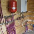 Instalație de alimentare cu apă pentru locuința dvs. Distribuție de apă într-o casă din lemn